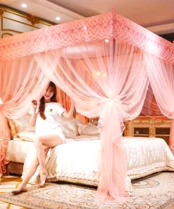 Mosquito net four-poster bed