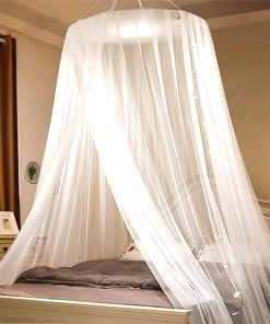 white mosquito net bed